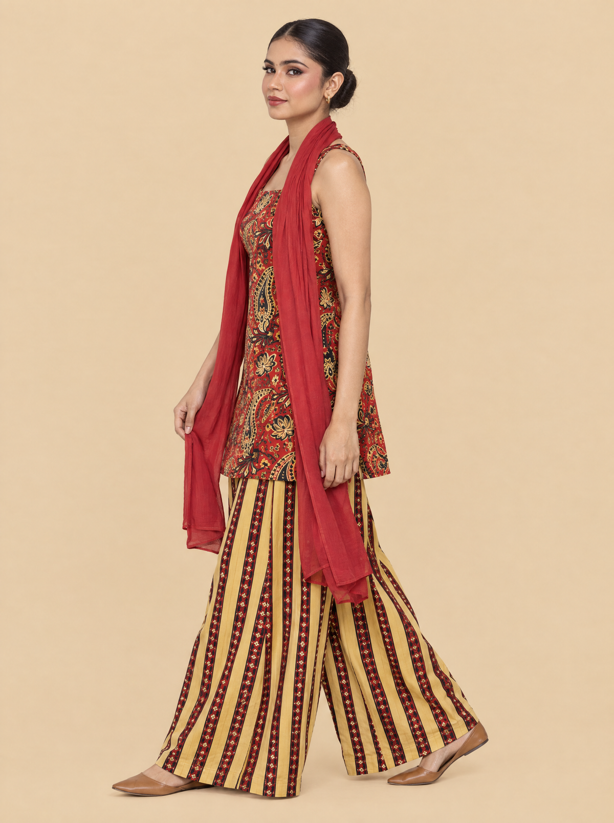 Sleeveless Printed Cotton Kurta Set with Striped Pants and Dupatta